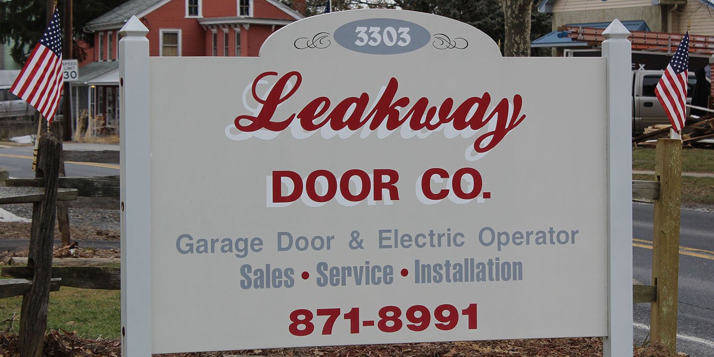 Leakway Door Co road sign for garage door & electric operator sales, service and installation